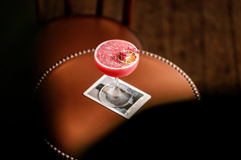 Grapefruit cocktail emerging from ultrasound image on brown surface with dotted circle outline